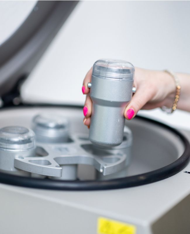 clark dental care staff holding canister