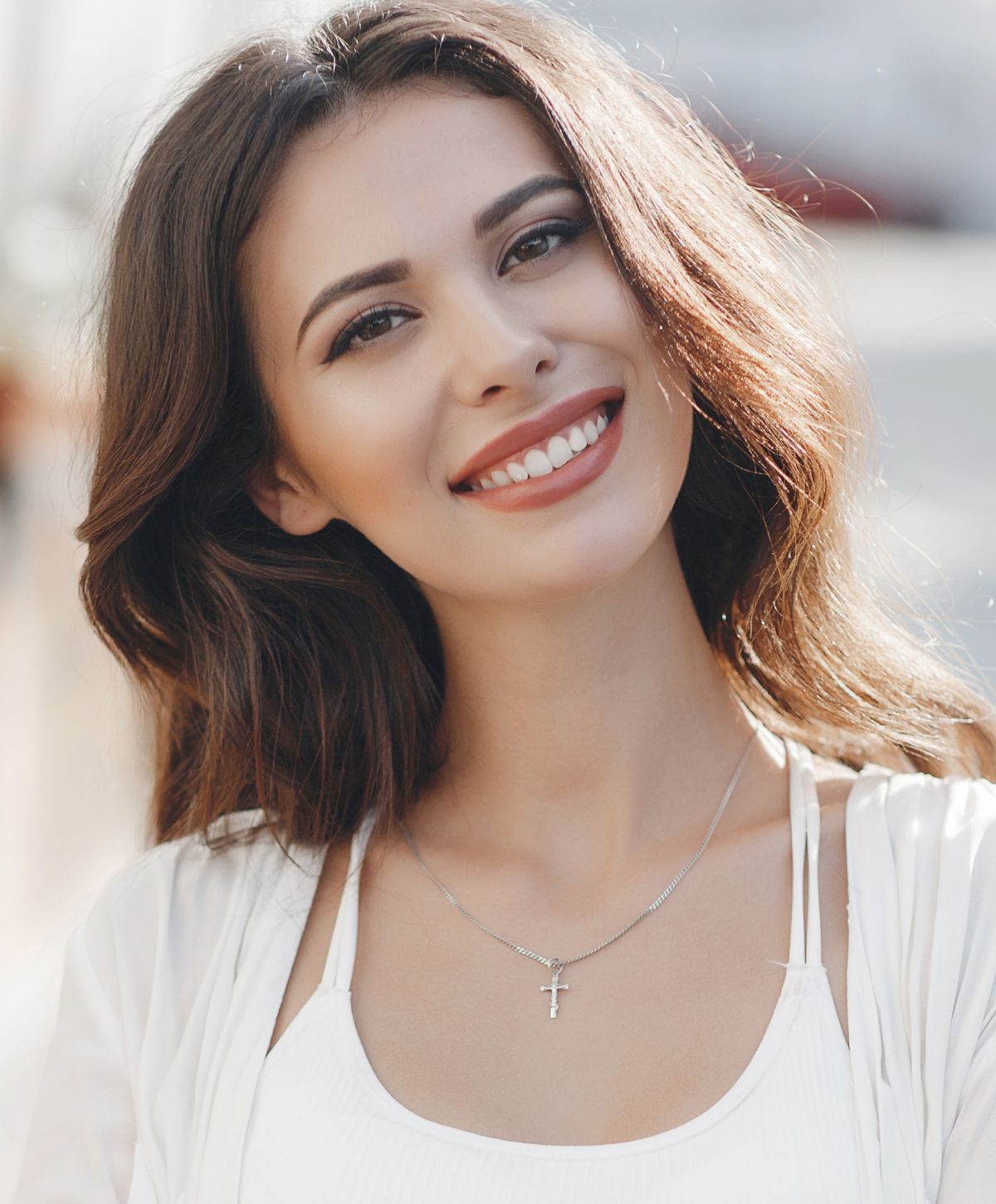 millburn teeth whitening model with brown hair